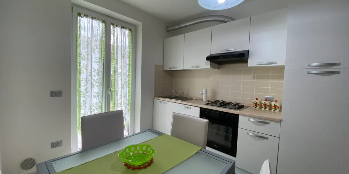 APPARTAMENTO TRILOCALE CON GIARDINO