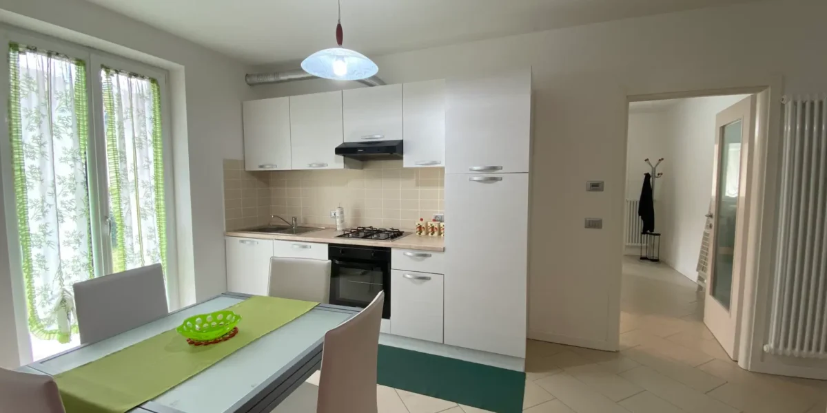 APPARTAMENTO TRILOCALE CON GIARDINO