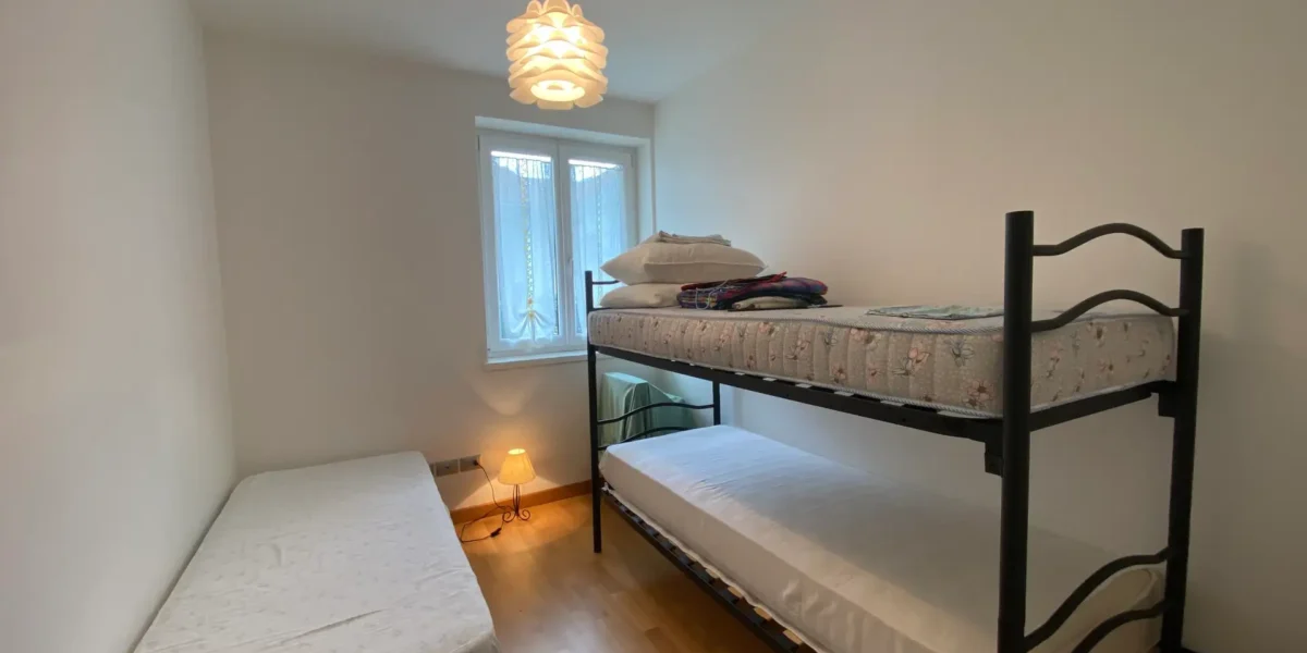 APPARTAMENTO TRILOCALE CON GIARDINO