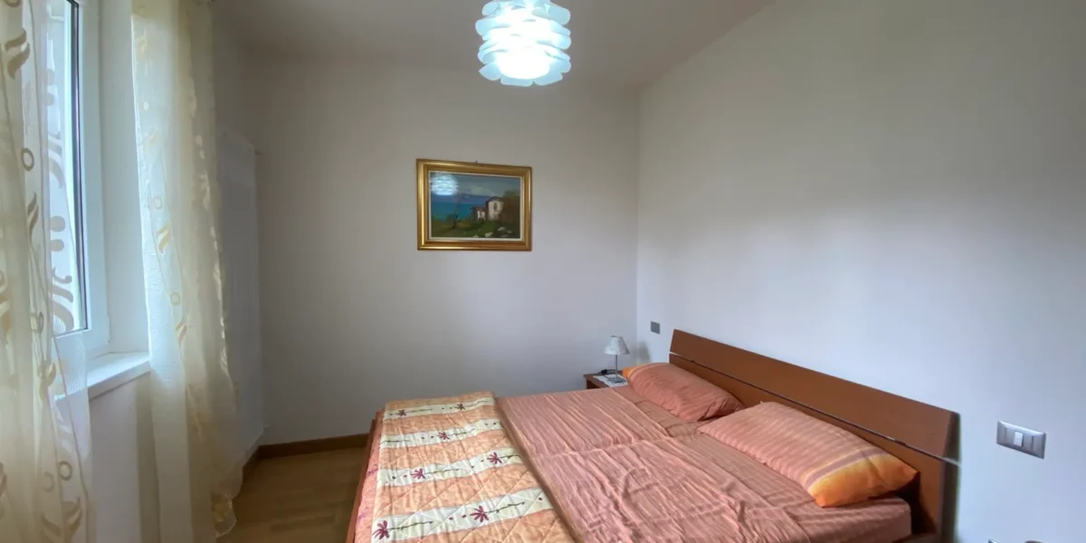 APPARTAMENTO TRILOCALE CON GIARDINO