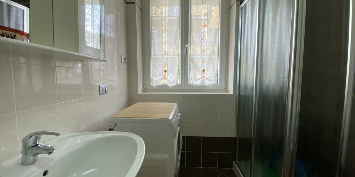 APPARTAMENTO TRILOCALE CON GIARDINO