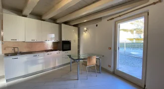 APPARTAMENTO TRILOCALE CON GIARDINO ESCLUSIVO