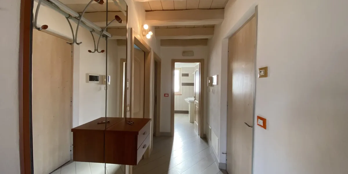 APPARTAMENTO TRILOCALE CON GIARDINO ESCLUSIVO