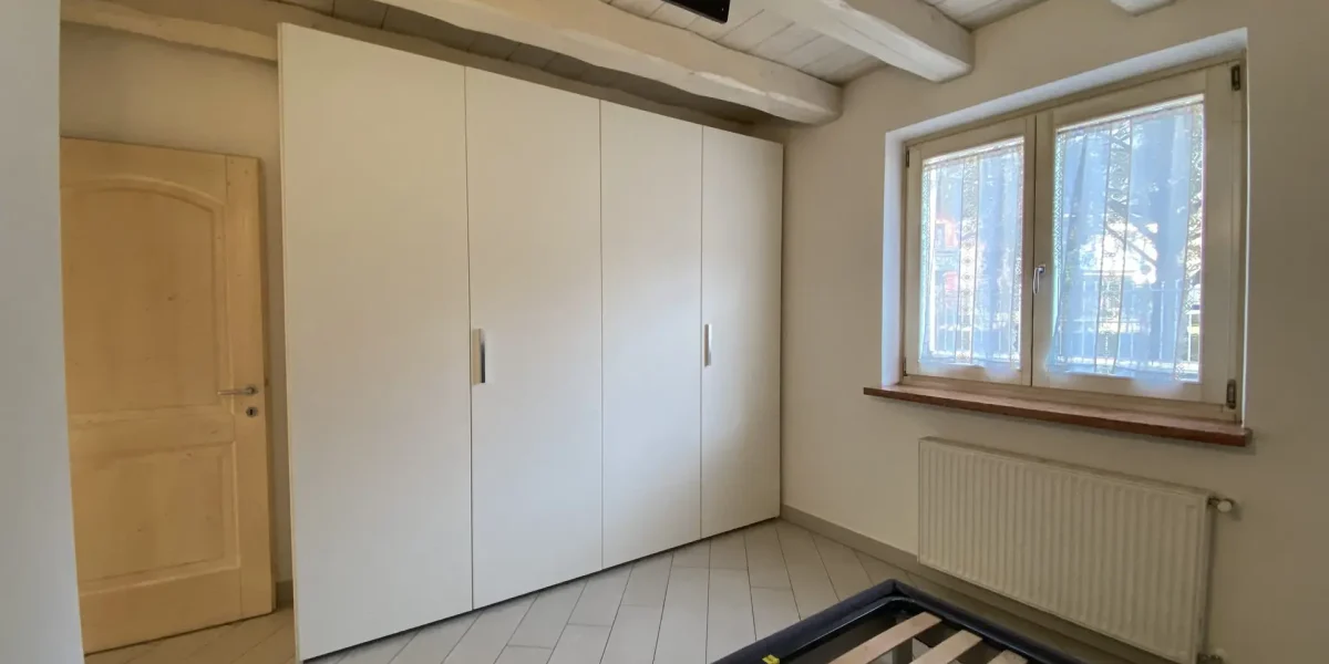 APPARTAMENTO TRILOCALE CON GIARDINO ESCLUSIVO