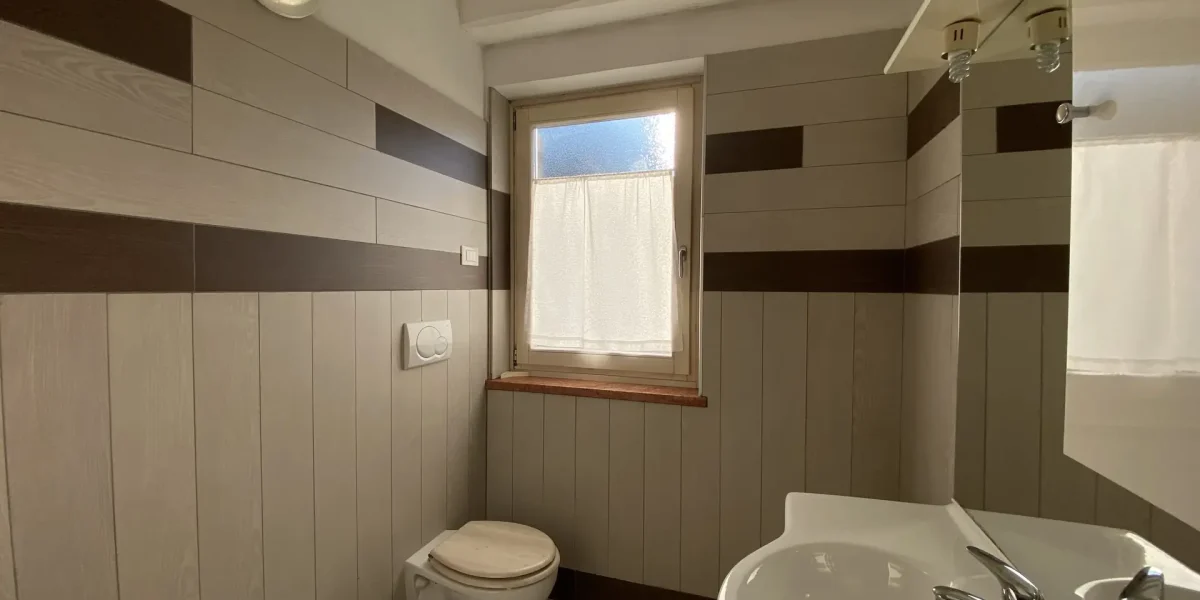 APPARTAMENTO TRILOCALE CON GIARDINO ESCLUSIVO