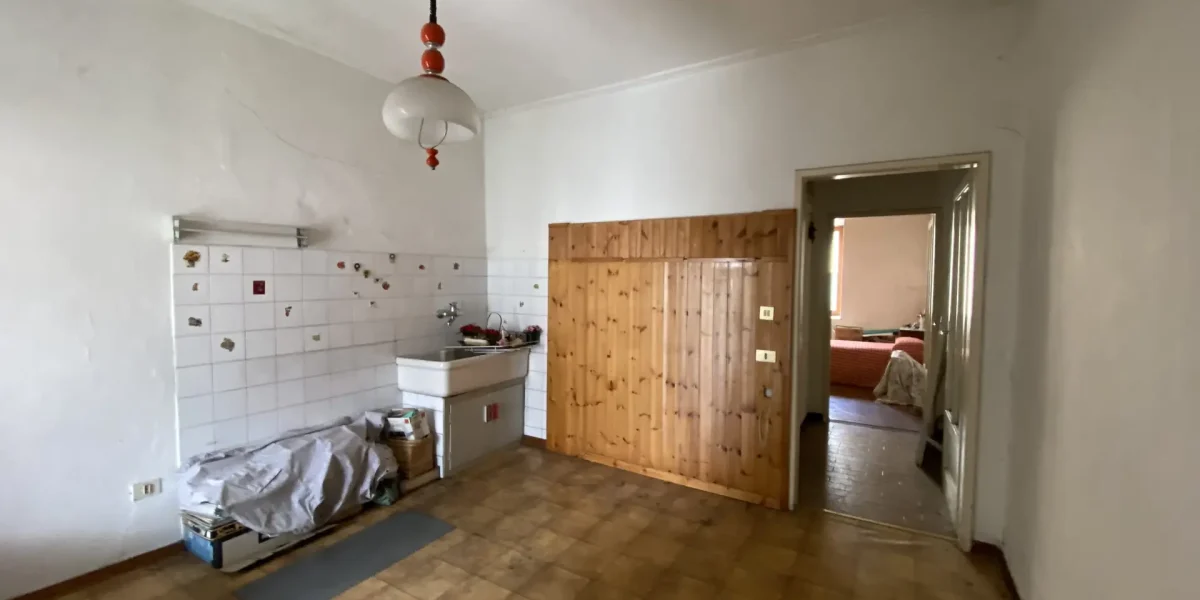 IN CENTRO, APPARTAMENTO CON GRANDE POTENZIALE