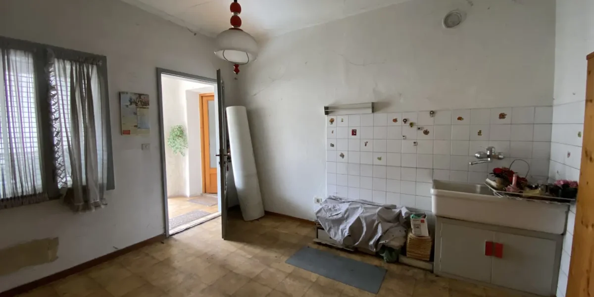 IN CENTRO, APPARTAMENTO CON GRANDE POTENZIALE